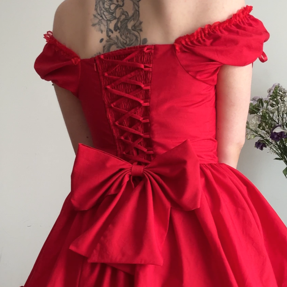 Add: Adjustable Lace Up Back